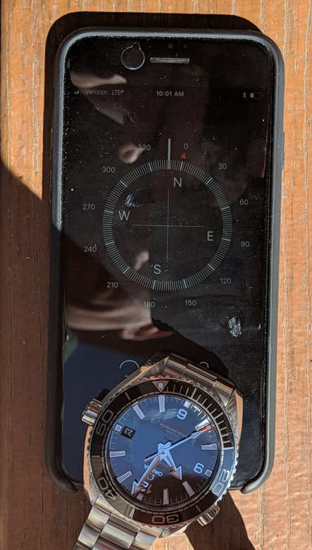 Comparing Watch And Compass